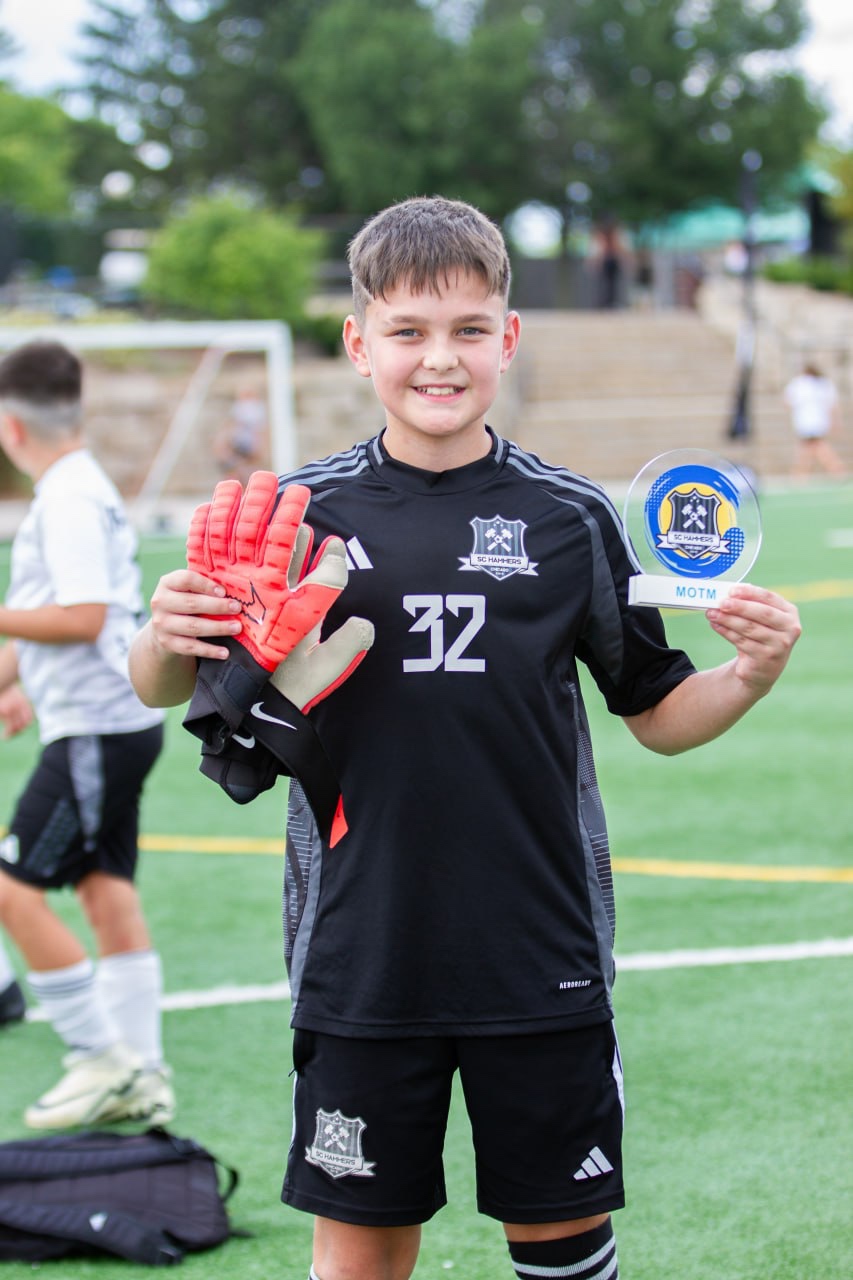 SC Hammers competitive team player with trophy